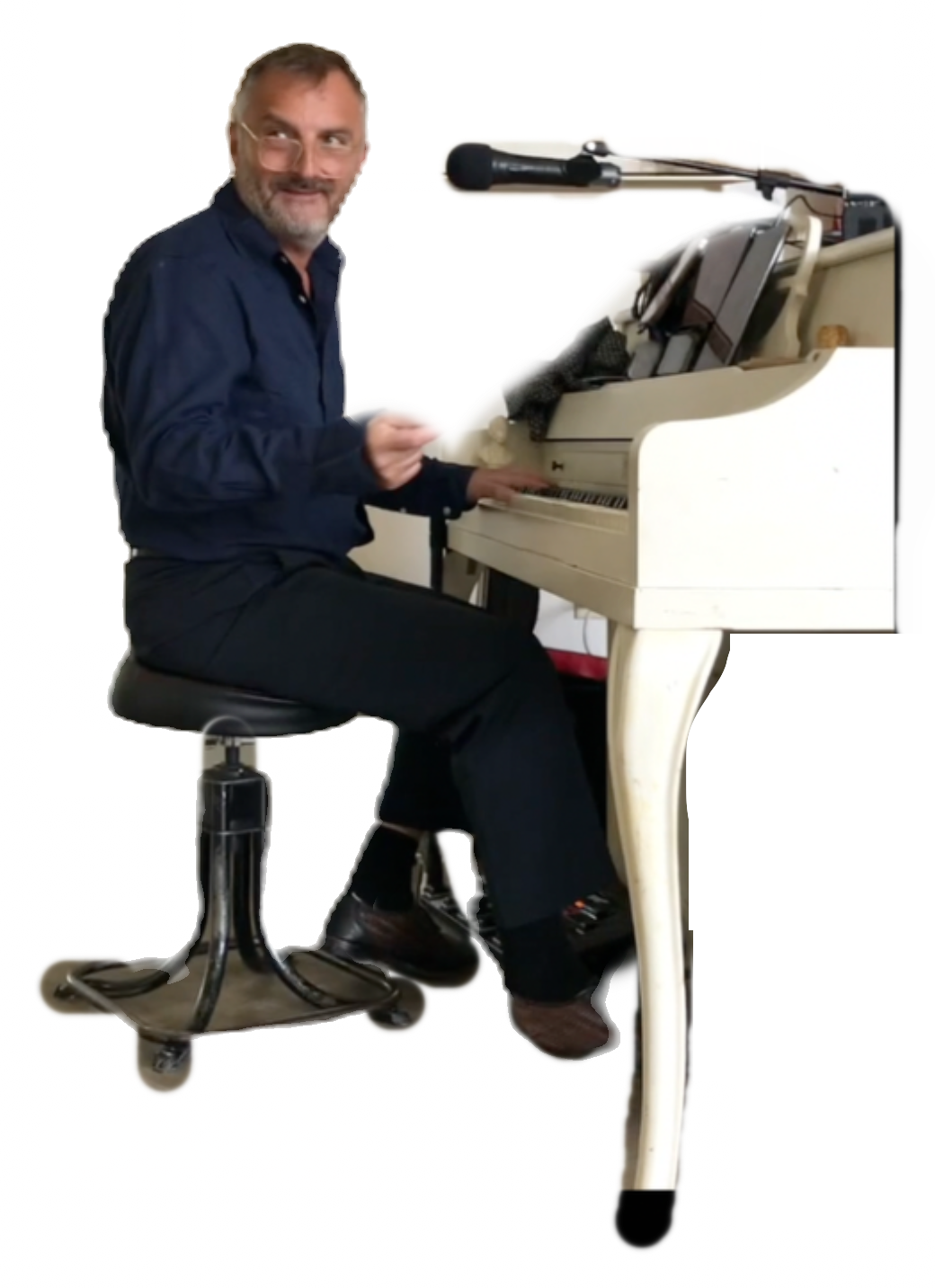Paul Tosh at white piano